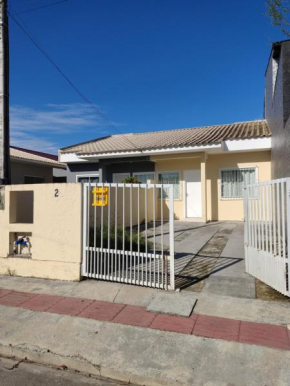 EM CASA